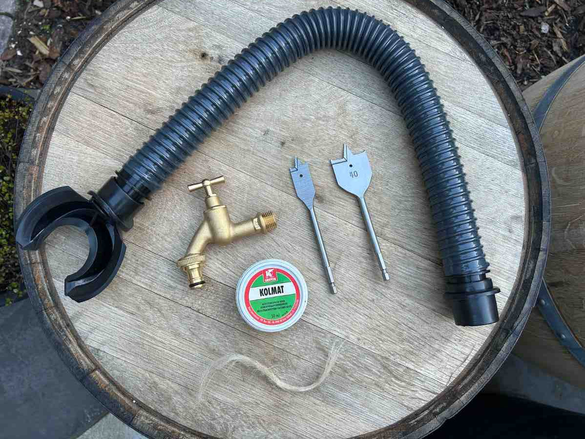 Regenton aansluiten op regenpijp met juiste hoogte en vulautomaat uitleg